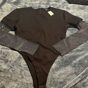 Not your average body suit! We love details!!!!!!
